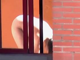 Neighbor spied through window shaving