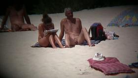 Sexy babes at the beach are playing on camera