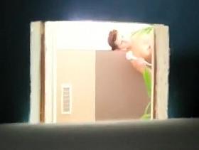 Voyeur films girl taking a shower
