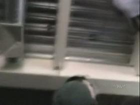 Sexy Asian babe lets a voyeur take a peek up her skirt