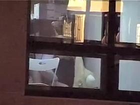 Voyeur noticed a blowjob in a building