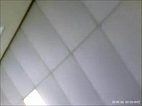 Luxurious fem spied sitting with her legs crossed up skirt