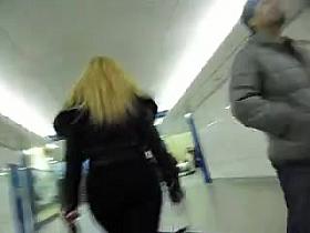 Candid large a-hole blond in taut leggings