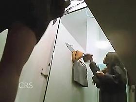 Asian teen trying new clothes