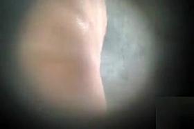 Woman gets spied on while taking a quick shower