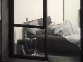 Voyeur neighbor films apartment window