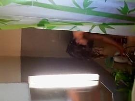 Teen spied taking a shower