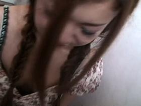 Smiling woman has some smooth looking boobies under her bra