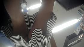 Sexy legs up the striped skirt of teen amateur babe