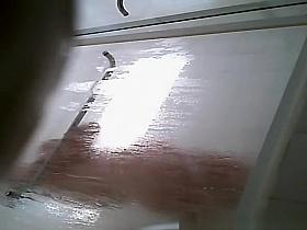 Milf taking shower in shower cabin