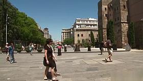 Shackled naked slut posing in public