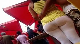 Huge fanny MILF followed in street candid voyeur video