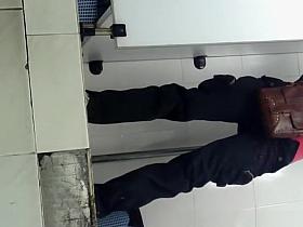 Japanese woman spied in public toilet pissing