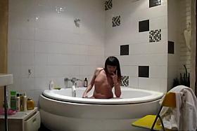 Friend's wife spied while masturbating