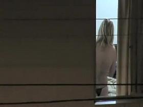 Watching my neighbor's wife undress