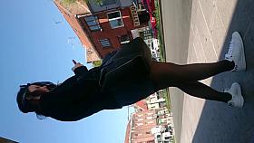 Candid pretty in black pantyhose