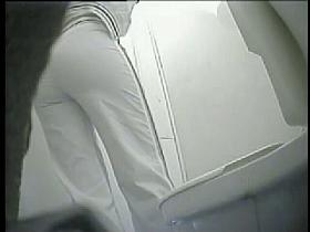 Peeing voyeurism with babe losing off her white pants