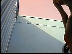 Slender girl stays in change room in erotic bikini