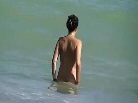 Topless woman and nudist friend