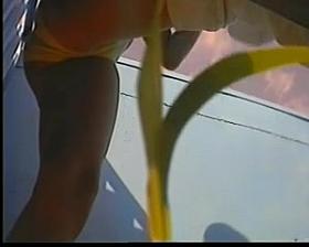 girl changing in beach cabin