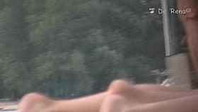Beach spy cam catching the nude bodies of resting people
