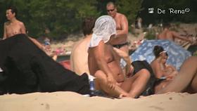 Semi nude, semi-regular beach with naked and dressed people