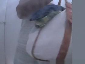 Chubby mature woman spied in beach cabin