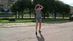 Skinny redhead girl in hot shorts does a little posing for my camera