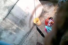 Desi aunty bathing caught by neighbour