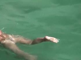 Horny couple in the water on an air mattress