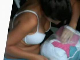 Canadian tourist dressing up in hotel room in Paris