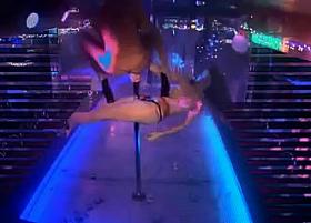 Two wild strippers on stage.