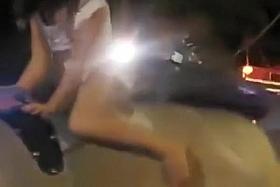 Babe rides the bull and reveals the ass and tits