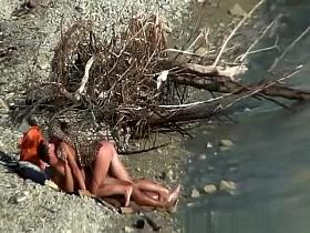 Nudist couple fucking by the water