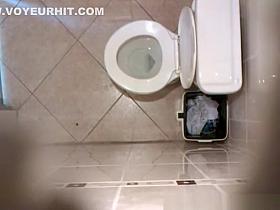 Spy camera in the toilet ceiling