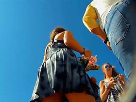 Cutie shows upskirt while fixing sandal