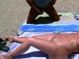 Two men masturbating to nude mature woman