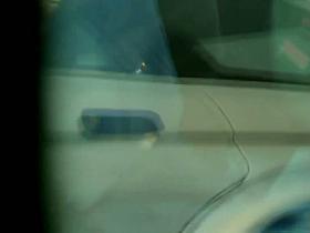 A voyeur films the crotch of a girl getting into her car