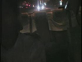 Lovely Japanese crammed on the back seat of a taxi