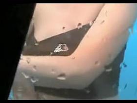 Small tit and peachy pussy beach cabin closeups