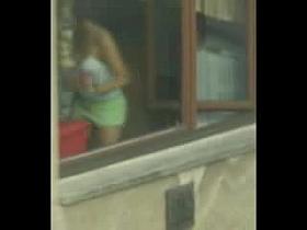 Summer babe cleaning windows