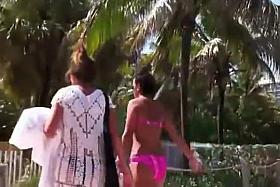 Checking out butts next to a beach