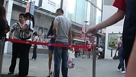 Hottie in miniskirt gets caught in a street candid clip