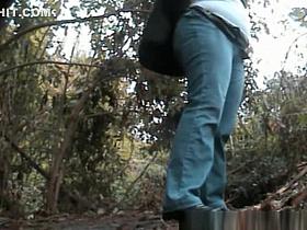 Chubby mature woman caught peeing