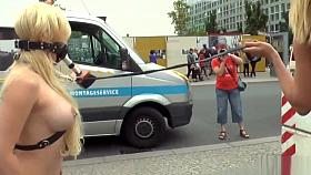 Busty blonde gets gangbang in public