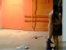 Horny lovers copulate doggystyle in an alley