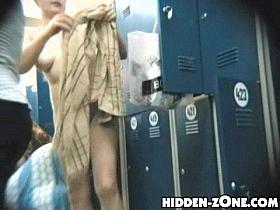 Busty fem is close to spycam in shower change room