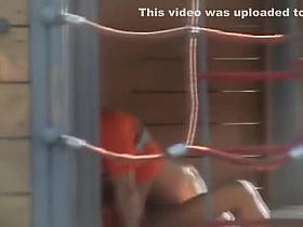 Adults copulating on the playground while filmed