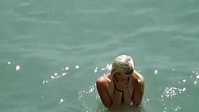 Soft and gentle girl has some fun with her boyfriend at the beach of Crimea