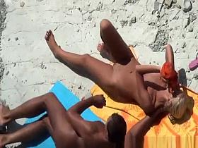Nudist woman fucked in the rocky beach